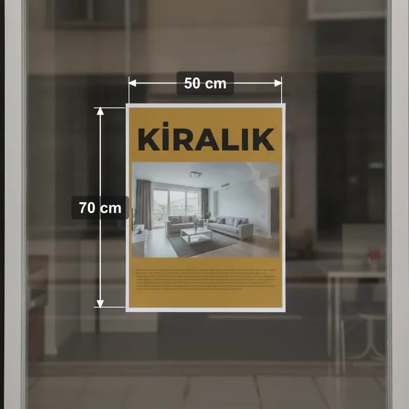Dükkan vitrinine asılmış 50 x 70 cm kiralık afişi, ölçüleriyle
